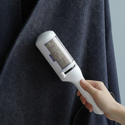 Brosse anti poil pour enlever les poils sur les vêtements et tissus